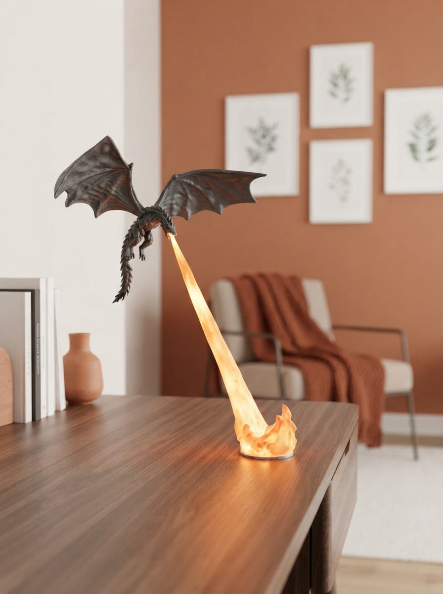 A 3D-printed dragon night light glowing with a warm flame-like light on a wooden desk in a modern room.